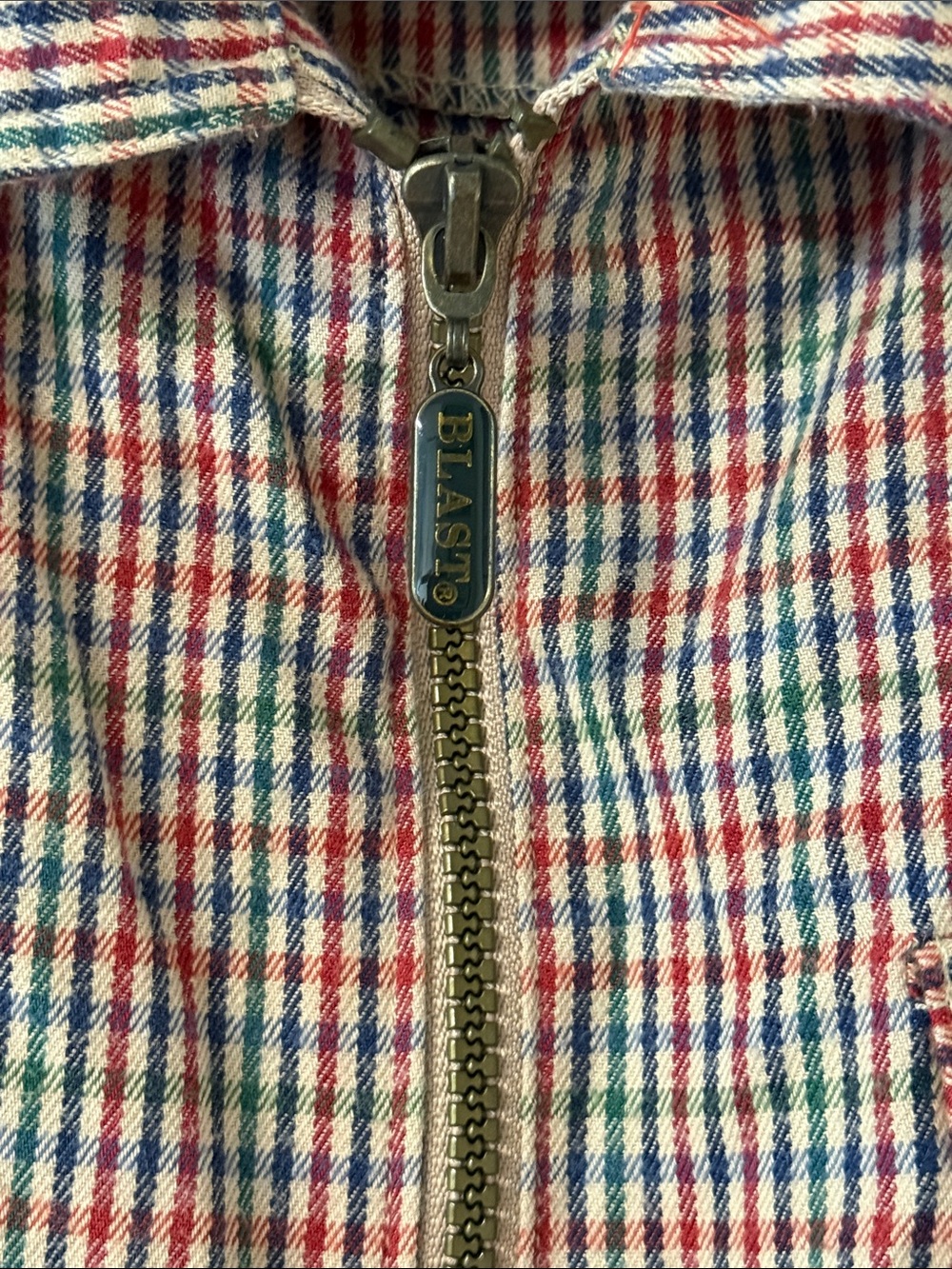 vintage Blast Petites zip-front jacket in a multi-color plaid pattern.